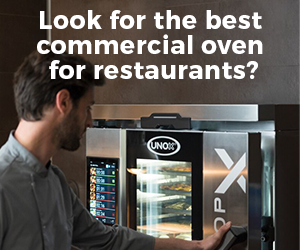 A man opening a Unox oven