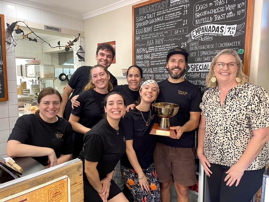 Minister for Tourism and Hospitality Marie-Clare Boothby presented the trophy for 'Regional People’s Choice Best Laksa Inspired-By' to the Yaye's Cafe team in Alice Springs last year.